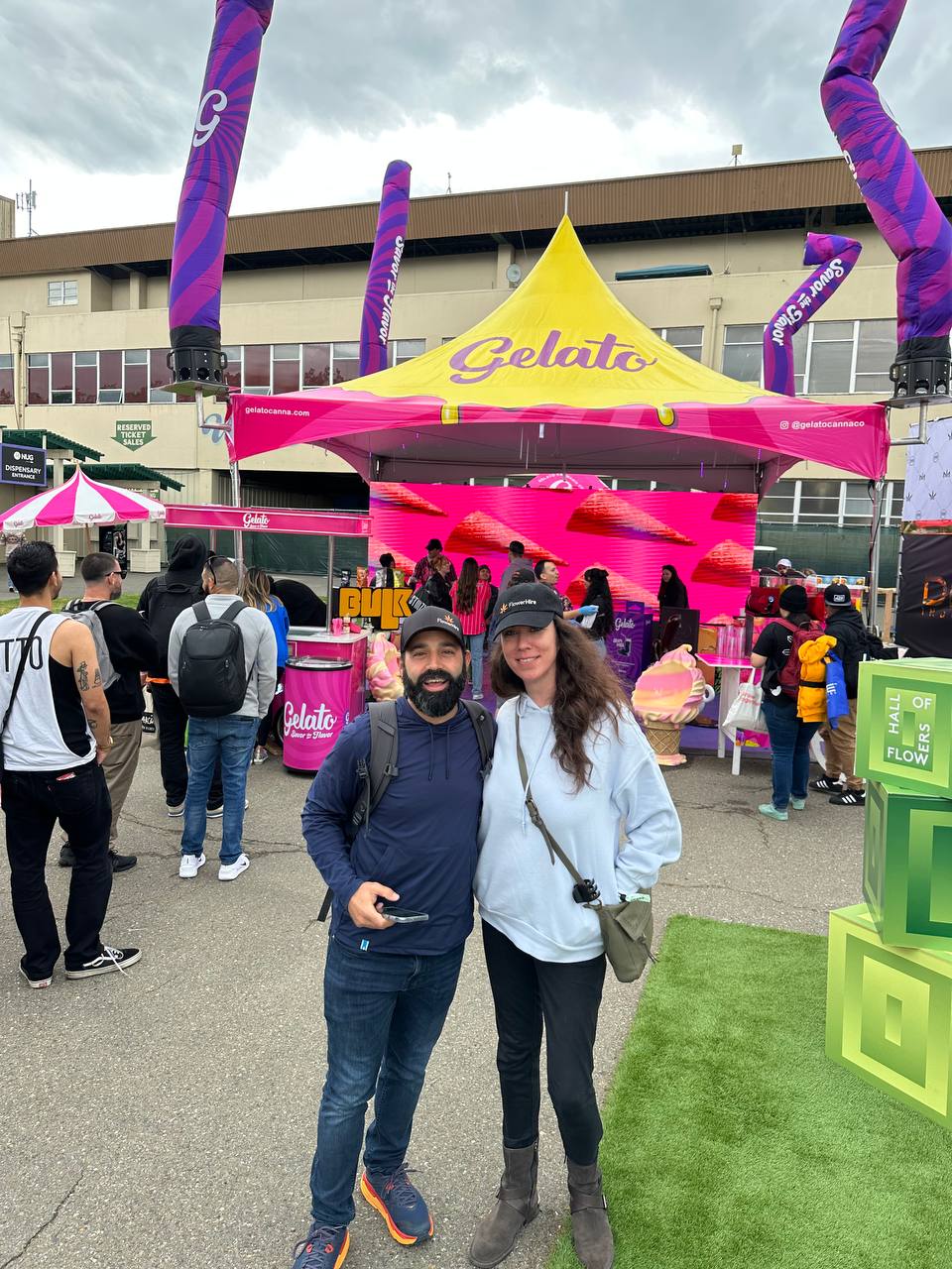 Flowerhire team members outside a tent at Hall of Flowers