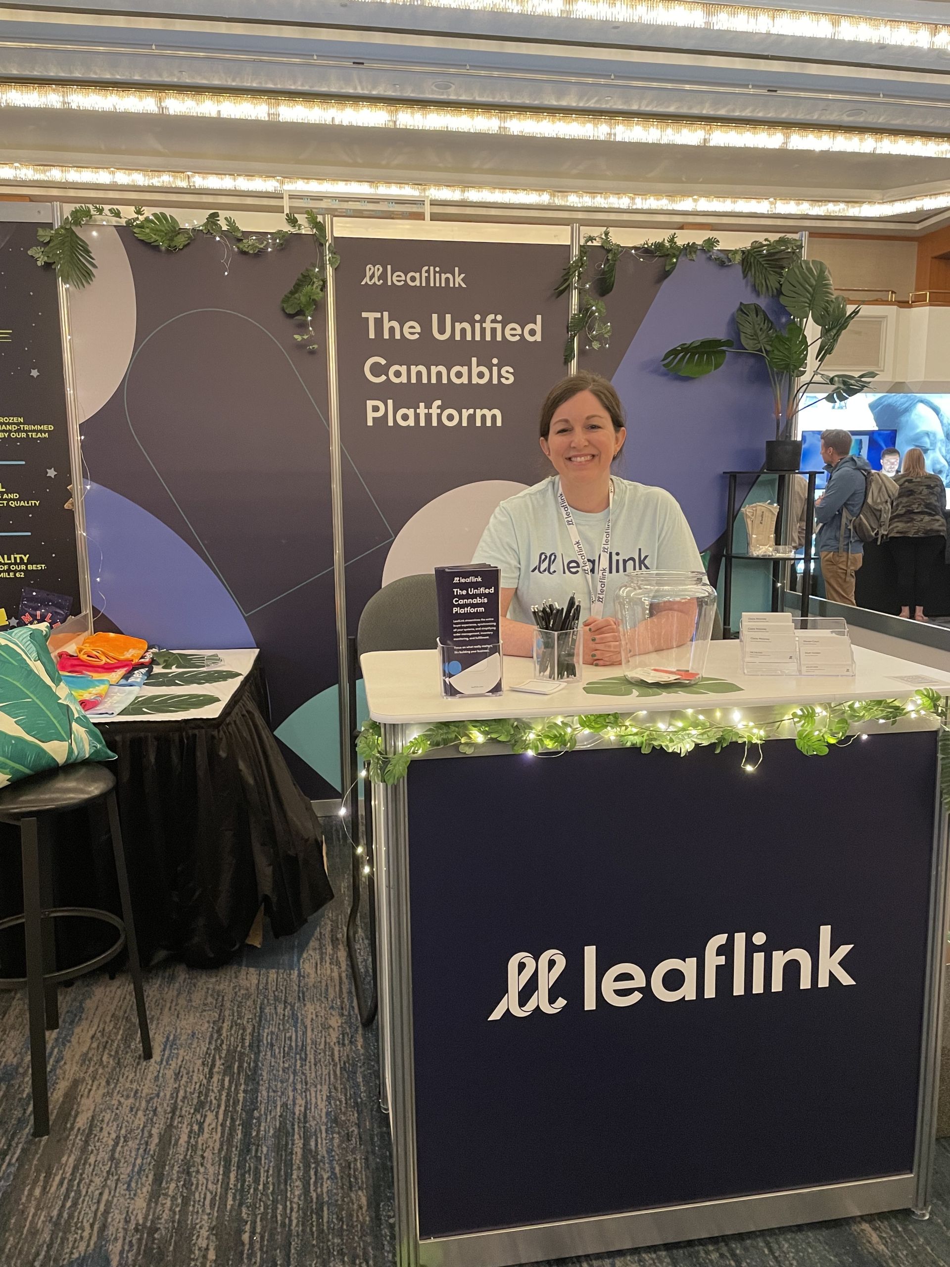 Claire Moloney at a LeafLink conference booth.